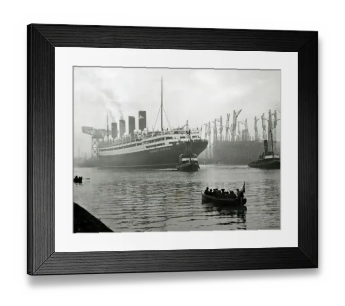 Framed Print : RMS Aquitania seen here being towed away from the John Brown shipyard on the River Clyde Framed Print : RMS Aquitania seen here being towed away from the John Brown shipyard on the River Clyde