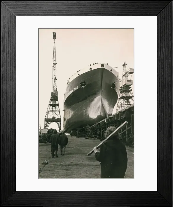 Framed Print : Shipyard Workers watch the launch of the Tocoma City as the new liner glides from her Framed Print : Shipyard Workers watch the launch of the Tocoma City as the new liner glides from her