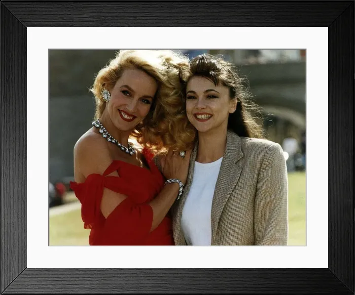 Framed Print : Jerry Hall Supermodel and Emma Samms Actress pose for a publicity shot for their new film Framed Print : Jerry Hall Supermodel and Emma Samms Actress pose for a publicity shot for their new film