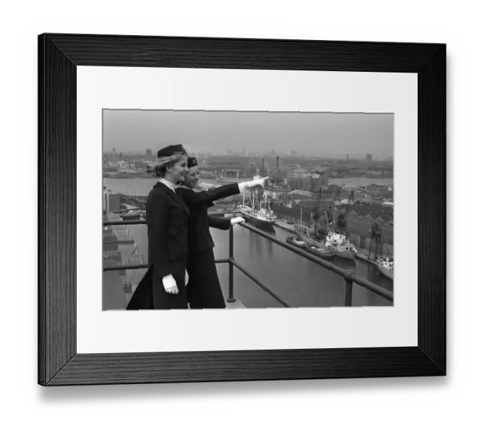 Framed Print : Port of London Dock Guides June 1965. Two of the guides talk as they look over the ships Framed Print : Port of London Dock Guides June 1965. Two of the guides talk as they look over the ships