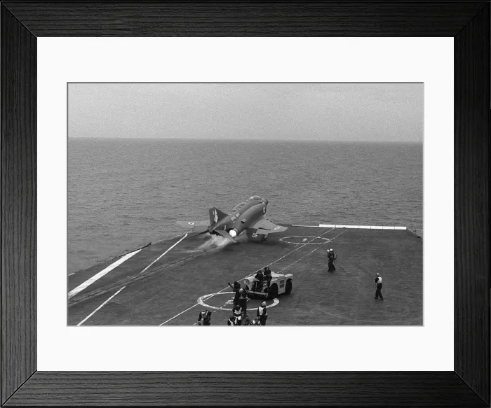 Framed Print : The deck crew on board HMS Ark Royal protect their ears as a McDonnell Douglas Phantom Framed Print : The deck crew on board HMS Ark Royal protect their ears as a McDonnell Douglas Phantom