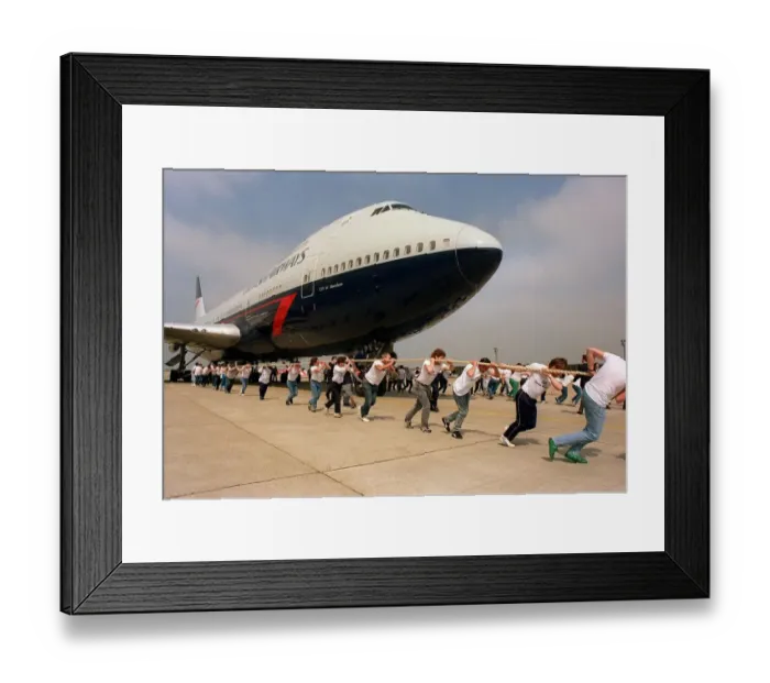 Framed Print : Charity Aircraft Pull. A British Airways Boeing 747 Jumbo Jet is pulled along the tarmac
