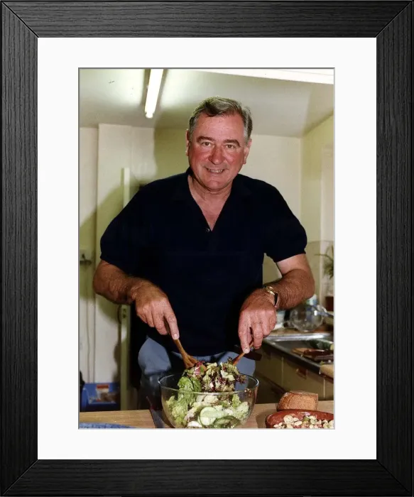 Framed Print : George Baker actor preparing salad in his kitchen dbase A©Mirrorpix