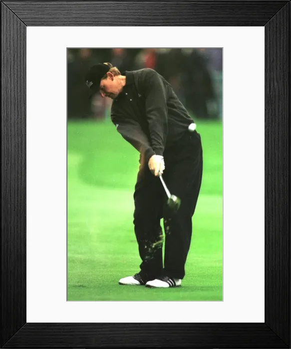 Framed Print : Ernie Els plays out of the rough on the 18th October 1998 during the 1998 World