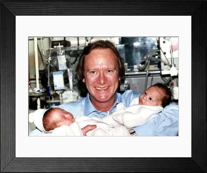 Framed Print : Denis Waterman Actor with two babies that were born premature at Guy Framed Print : Denis Waterman Actor with two babies that were born premature at Guy