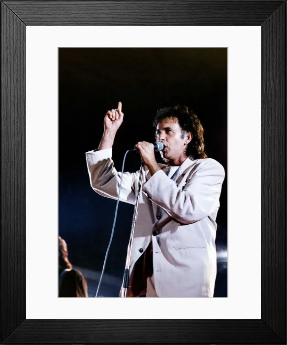 Framed Print : David Essex Singer Actor singing on stage A©Mirrorpix