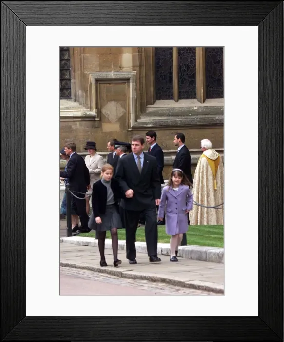 Framed Print : Prince Andrew with Princess Beatrice and Eugenie after attending a Easter Sunday service Framed Print : Prince Andrew with Princess Beatrice and Eugenie after attending a Easter Sunday service