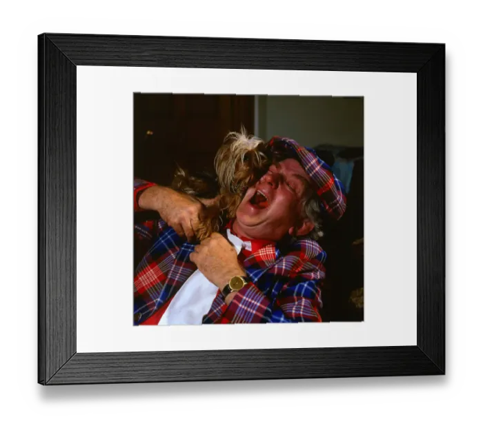 Framed Print : Comedian Hector Nicol with his pet dog January 1984 Framed Print : Comedian Hector Nicol with his pet dog January 1984