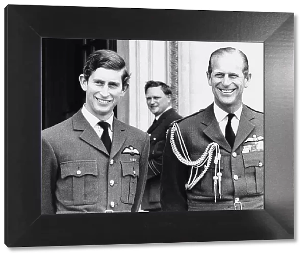 Prince Charles, the Prince of Wales, with his father Prince Philip