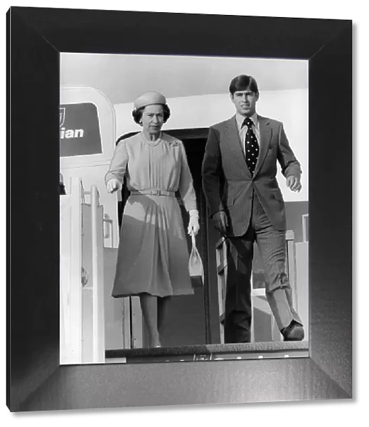 Queen Elizabeth with her son Prince Andrew on aircraft steps Circa 1980