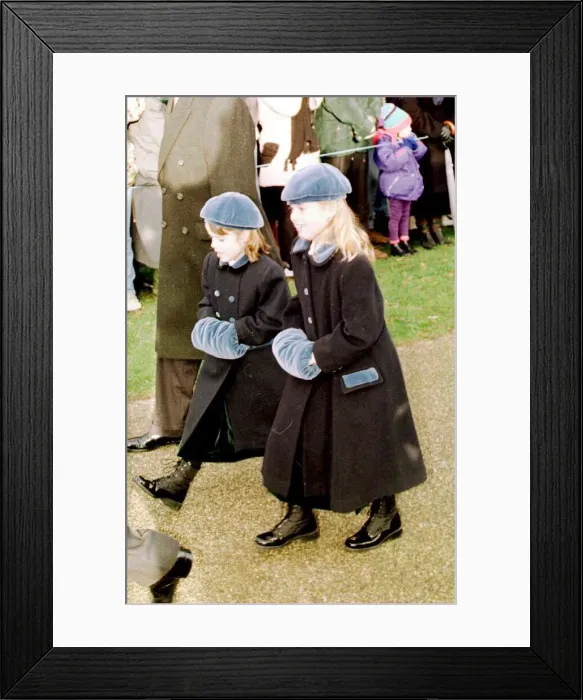 Framed Print : Princess Beatrice and Princess Eugenie wrap up warm in matching outfits to keep out