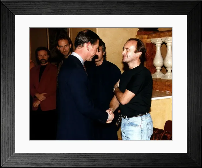 Framed Print : Phil Collins meeting Prince Charles after a one off concert at the royal abert hall Framed Print : Phil Collins meeting Prince Charles after a one off concert at the royal abert hall