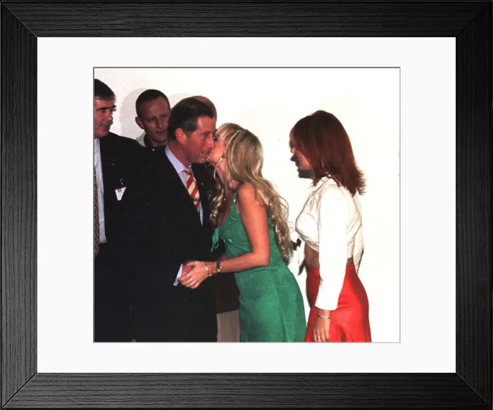 Framed Print : Prince Charles gets a kiss of Emma of the Spice Girls when he takes his son Prince Harry Framed Print : Prince Charles gets a kiss of Emma of the Spice Girls when he takes his son Prince Harry