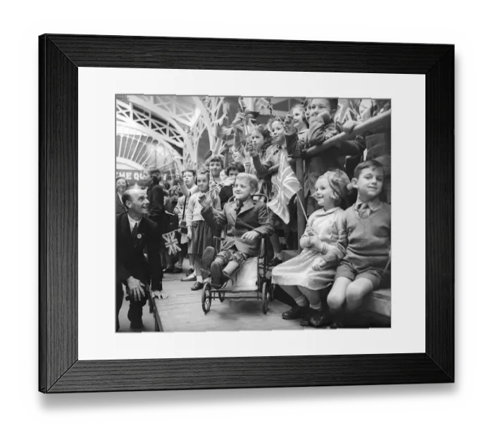 Framed Print : Children with union jack flags smile at Queen Elizabeth on tour of Barnstable Framed Print : Children with union jack flags smile at Queen Elizabeth on tour of Barnstable