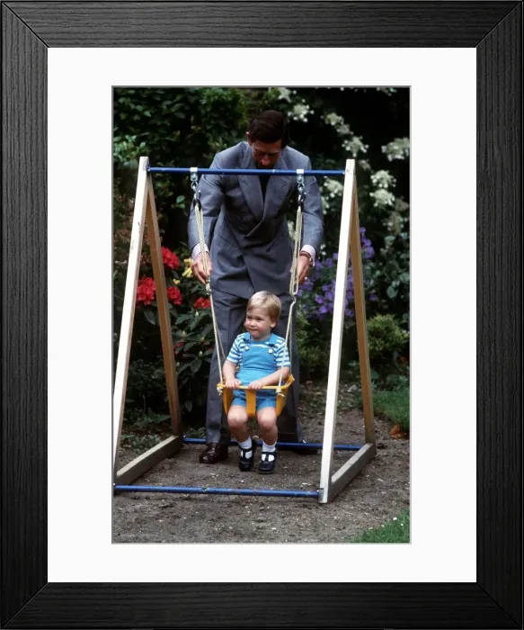 Framed Print : Prince Charles with Prince William on his 2nd birthday June 1984 Framed Print : Prince Charles with Prince William on his 2nd birthday June 1984
