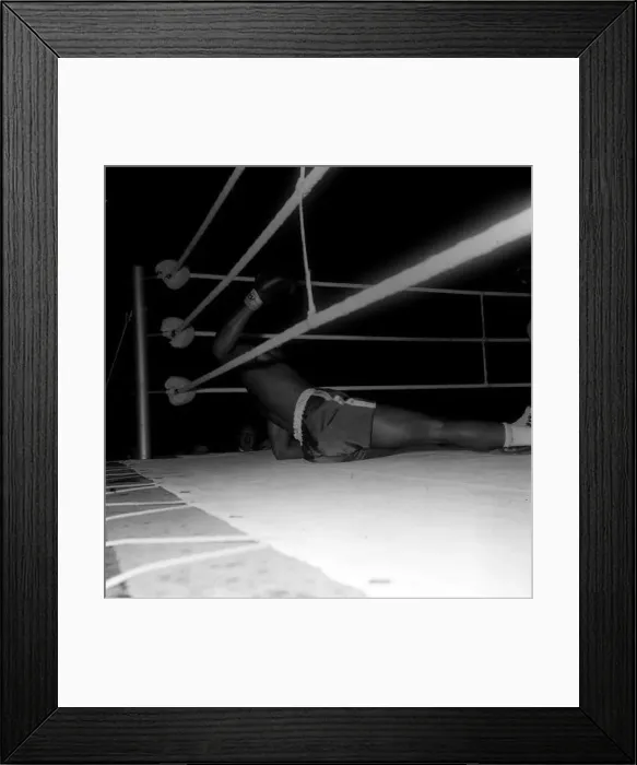 : Action during the non-title heavyweight fight between American Cassius Clay : Action during the non-title heavyweight fight between American Cassius Clay