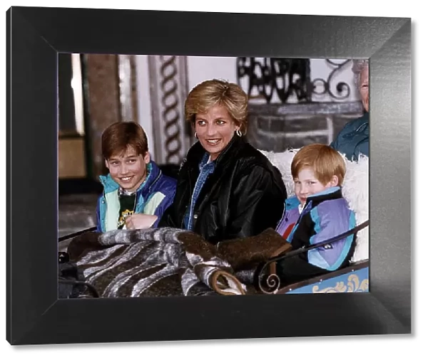 Princess Diana with her two sons Prince William and Prince Harry about to go on a sleigh