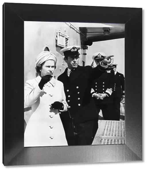 Queen Elizabeth and Prince Charles touring the warship HMS Norfolk, the 6