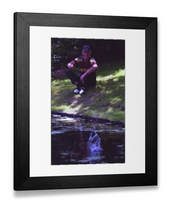 Framed Print : Justin Rose relaxes by throwing a stone in to the water at Hilversum in Holland during Framed Print : Justin Rose relaxes by throwing a stone in to the water at Hilversum in Holland during
