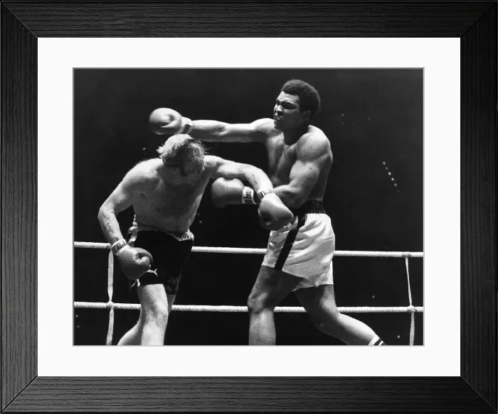 Framed Print : American Heavyweight Champion of the World Muhammad Ali in action against Richard Dunn of Framed Print : American Heavyweight Champion of the World Muhammad Ali in action against Richard Dunn of