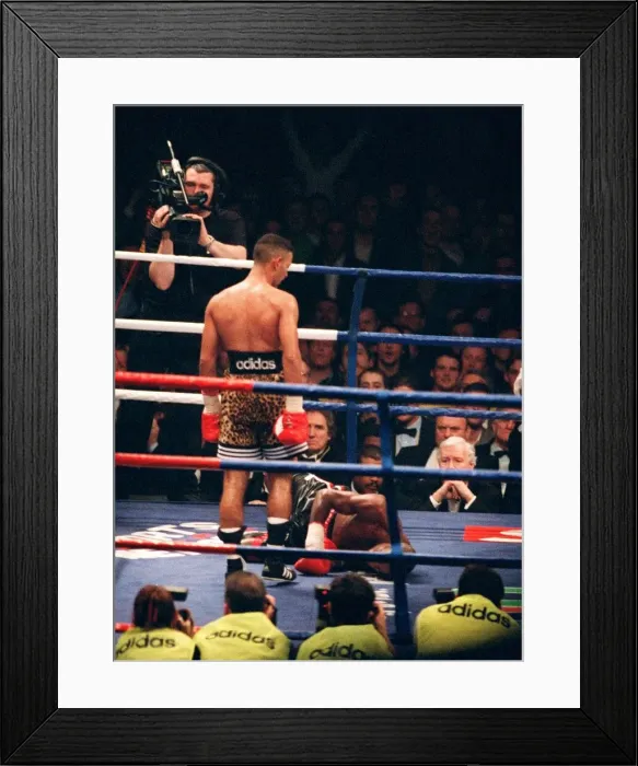 Framed Print : Prince Naseem Hamed looks down at Tom Boom Boom Johnson after knocking him to the canvas Framed Print : Prince Naseem Hamed looks down at Tom Boom Boom Johnson after knocking him to the canvas