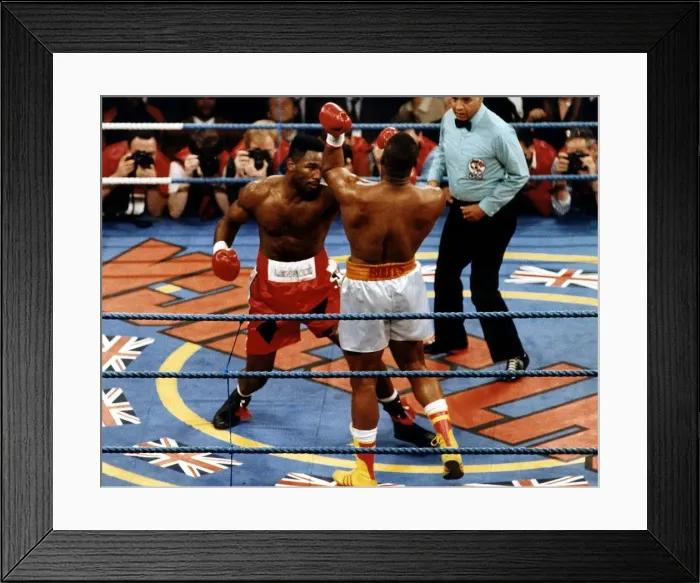 Framed Print : Lennox Lewis boxer in fight action against Donovan Razor'ruddock Framed Print : Lennox Lewis boxer in fight action against Donovan Razor'ruddock