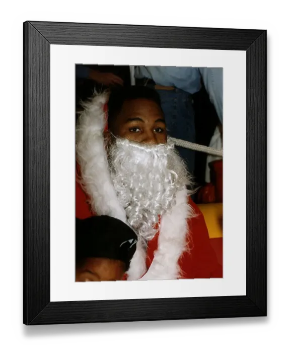 Framed Print : Lennox Lewis WBC World Boxing heavyweight champion at Sky TV dressed up as Santa Claus
