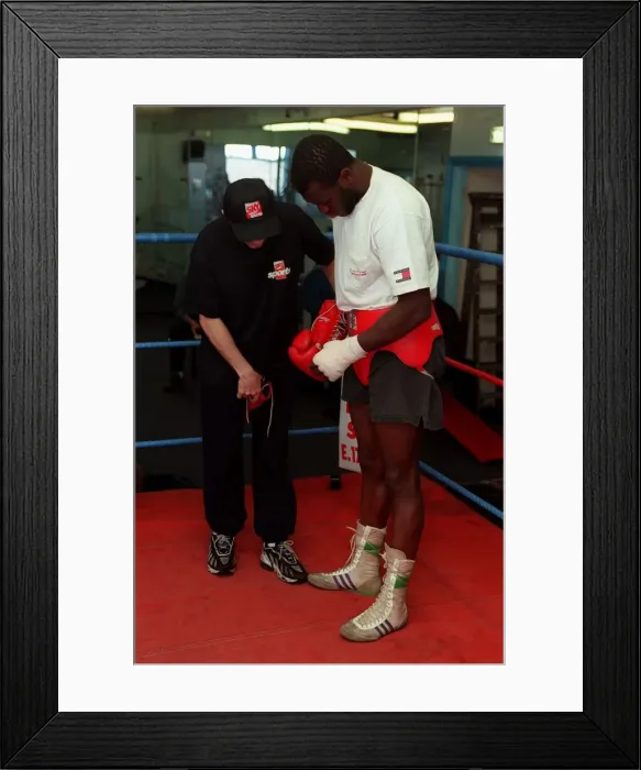 Framed Print : Herbie Hide Boxer putting on boxing gloves with his trainner Jim Mcdonnell