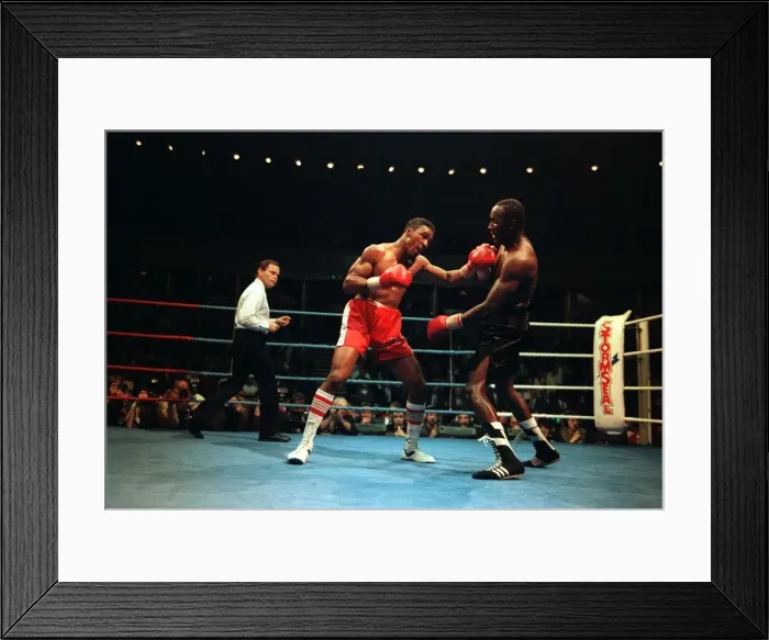 Framed Print : Michael Watson Boxing Middleweight contacts with a left punch against Mike McCullam Framed Print : Michael Watson Boxing Middleweight contacts with a left punch against Mike McCullam