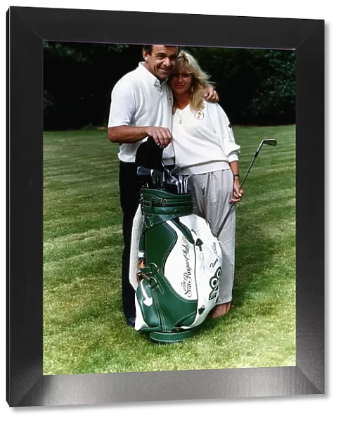 Tony Jacklin golfer cuddles a girlfriend January 1989