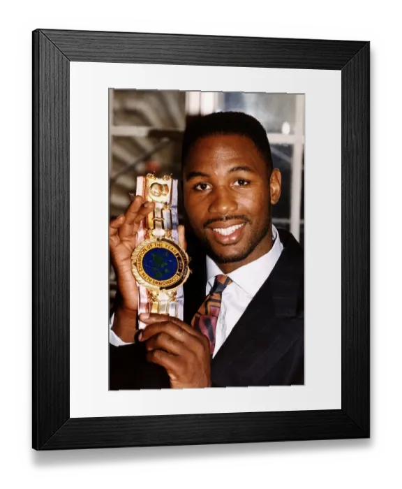 Framed Print : Lennox Lewis WBC World Heavyweight Boxing Champion showing his Commonwealth Champion of Framed Print : Lennox Lewis WBC World Heavyweight Boxing Champion showing his Commonwealth Champion of