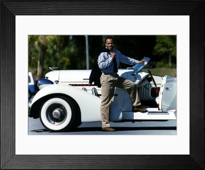 Framed Print : Lloyd Honeygham Boxer stands by a white classic car Framed Print : Lloyd Honeygham Boxer stands by a white classic car