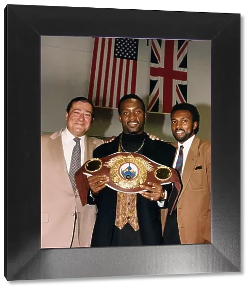 Nigel Benn Boxer with Manager Ambrose Mendy and American Promoter Bob Arun