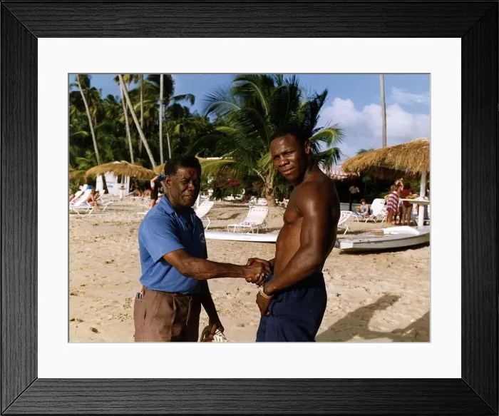 Framed Print : Chris Eubank Boxing shaking hands with man on beach Framed Print : Chris Eubank Boxing shaking hands with man on beach