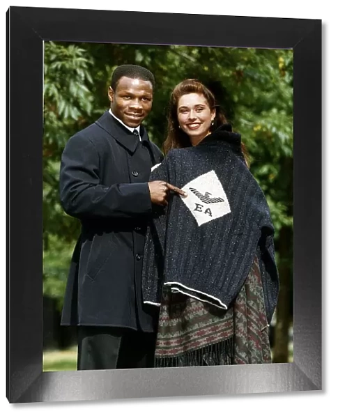 Chris Eubank Boxer with model Phillipa Hilton after donated to the Oxfam for their Dress