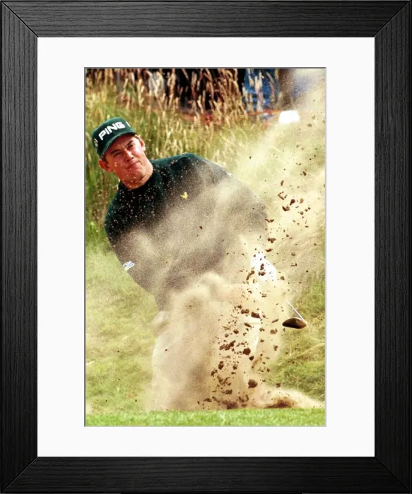 Framed Print : Lee Westwood hits his way out of a bunker during the third round of the Open Golf Framed Print : Lee Westwood hits his way out of a bunker during the third round of the Open Golf