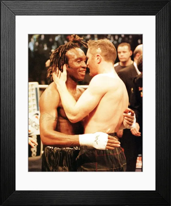 Framed Print : Steve Collins celebrates after beating Nigel Benn (L) in the WBO middleweight fight in Framed Print : Steve Collins celebrates after beating Nigel Benn (L) in the WBO middleweight fight in