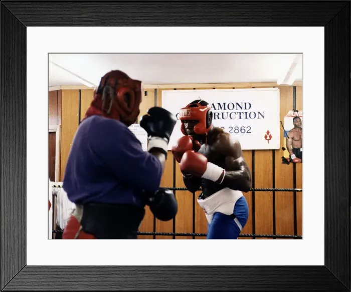 Framed Print : Frank Bruno sparring in gym
