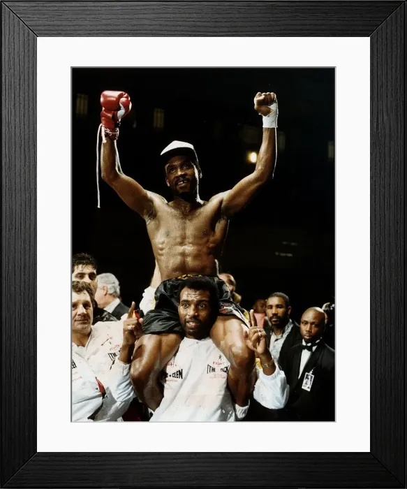 Framed Print : Nigel Benn Boxer Being lifted on the shoulders of Ambrose Mendy after beating Robbie Framed Print : Nigel Benn Boxer Being lifted on the shoulders of Ambrose Mendy after beating Robbie