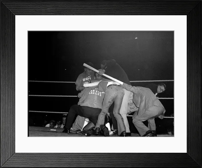 Framed Print : Marvin Hagler under protection after crowd protest 1980 over fight against Alan Framed Print : Marvin Hagler under protection after crowd protest 1980 over fight against Alan