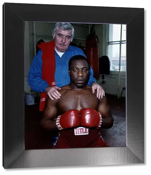 Gary Mason boxer with coach in a gym