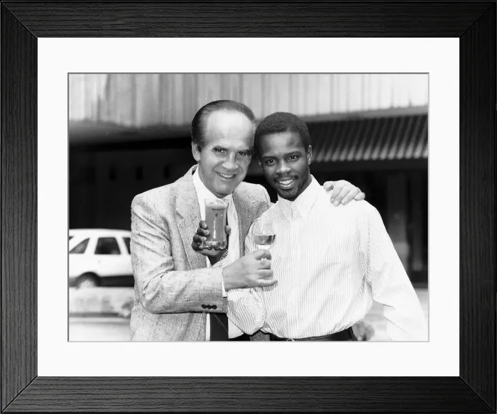 Framed Print : Mickey Duff Boxing Manager and Promoter drinks a toast with one of his Boxers Duke