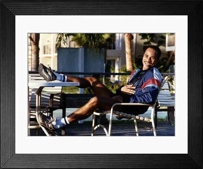 Framed Print : LLoyd Honeyghan Boxing Sitting on chair with legs on table Framed Print : LLoyd Honeyghan Boxing Sitting on chair with legs on table