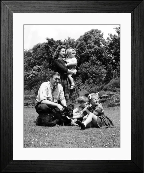 Framed Print : Tommy Farr Welsh Heavyweight Boxer with his wife and family Framed Print : Tommy Farr Welsh Heavyweight Boxer with his wife and family