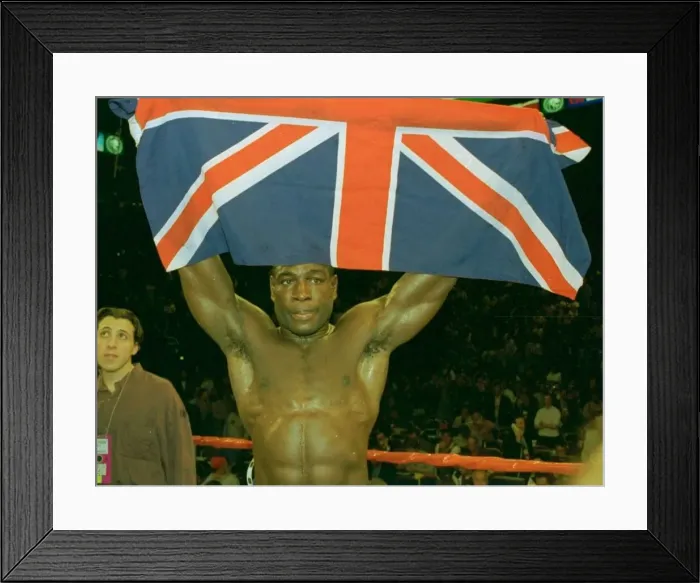 Framed Print : Frank Bruno holds up the union jack after his third round defeat at the hands of Mike Framed Print : Frank Bruno holds up the union jack after his third round defeat at the hands of Mike