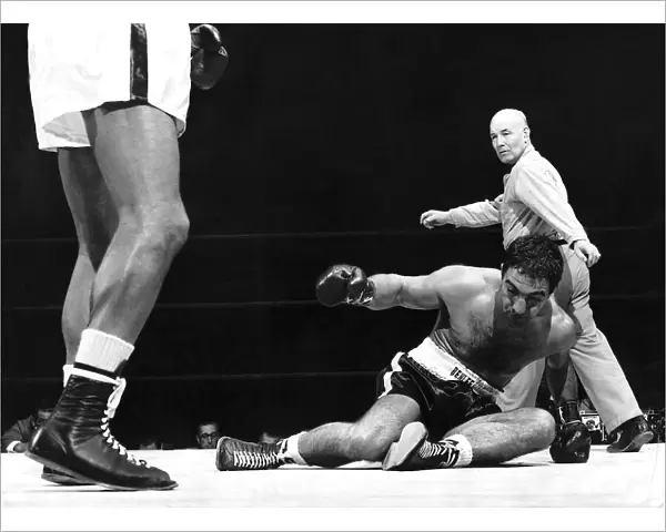 Rocky Marciano Boxer downed in the first round of his heavyweight title fight with Jersey
