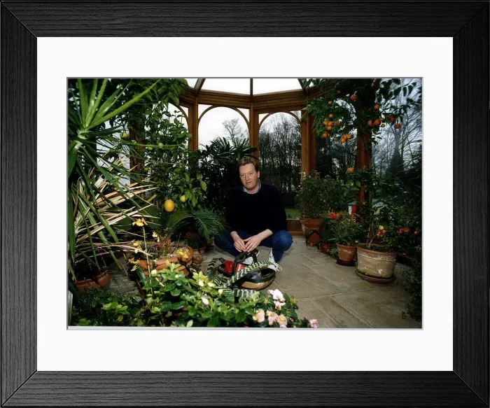 Framed Print : Frank Warren Boxing Promoter at home in his greenhouse