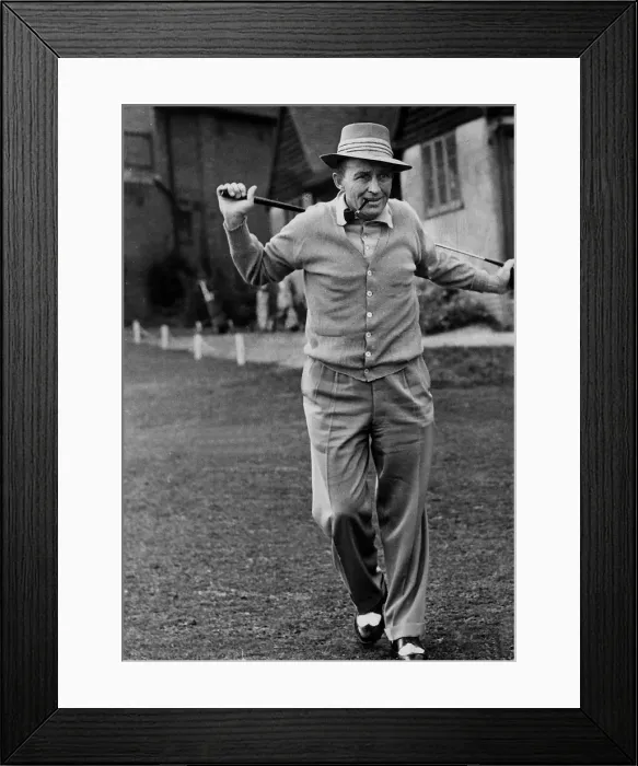 Framed Print : Bing Crosby with pipe contemplates next golf shot 1952 Framed Print : Bing Crosby with pipe contemplates next golf shot 1952