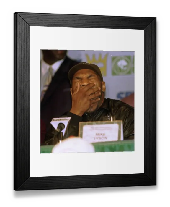 Framed Print : Mike Tyson listens to Don Kings speech during the head to head press conference for Framed Print : Mike Tyson listens to Don Kings speech during the head to head press conference for
