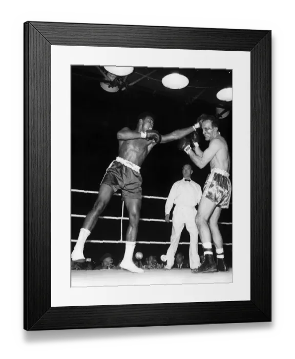 Framed Print : Action during the non-title heavyweight fight between American Cassius Clay Framed Print : Action during the non-title heavyweight fight between American Cassius Clay